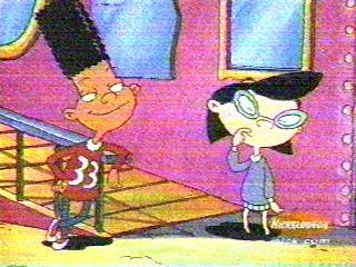 Gerald and Phoebe (in their usual clothing) in front of the mirrors at the Cheese Fair